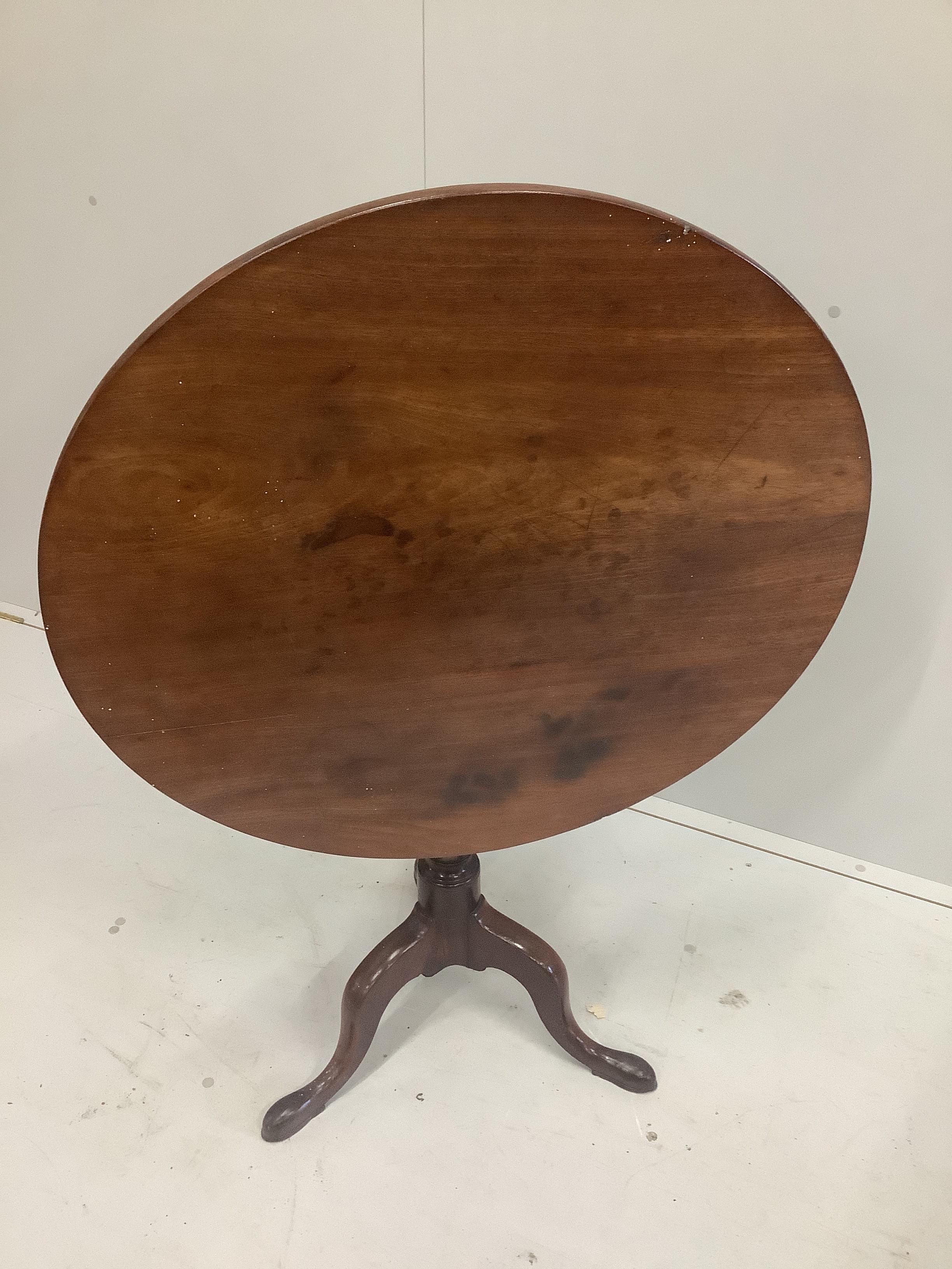 A George III mahogany tilt top tripod table, diameter 77cm